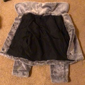 Grey, fuzzy, shorter coat.